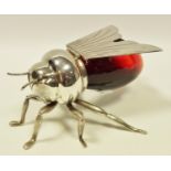 An Elkington novelty preserve jar/pot as a bee, red body, six legs, wing lid, 8.5cm high