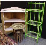 A tubular metal bamboo effect three tier shelf unit; a hexagonal mother of pearl inlaid occasional