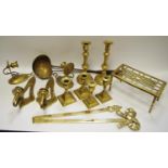 Metal Ware -a set of four brass boudoir candlesticks, 11cm high; two brass and steel ladles; brass