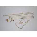 A 9ct gold broken and damaged necklaces, a pair of 9ct gold knot earrings, 14.3g; a cut 14k gold