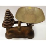 A late 19th century cast iron balance shop scale, J & J Whitehouse and other weights