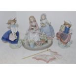 ***Please note amended image****A Lladro figural group of girls selling flowers under a parasol,