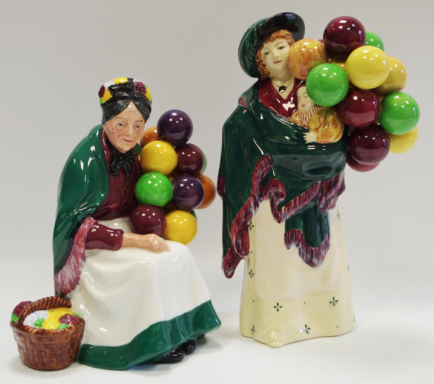 A Royal Doulton figure, The Balloon Seller HN583; another, The Old Balloon Seller HN1315 (2)