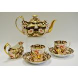 A Royal Crown Derby Imari 2451 pattern teapot, pair of cups and saucers, etc (7)