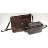 Luxury Fashion - an Italian brown ostrich skin lady's handbag, 31cm wide; another, black, 23cm wide,