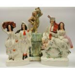 Ceramics - a 19th century drip glazed model naked figure on horse back; a Staffordshire figure group