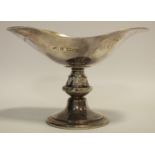 A silver Gothic style pedestal bon bon dish, the pedestal decorated with fox masks, B.S. Ltd,