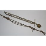 An Edwardian silver Albert chain, double drop suspension, horse shoe compass terminal, T-Bar centre;