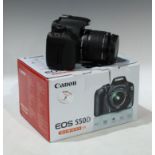 Cameras - a Canon EOS 550D EF-S 18-55 IS II kit, boxed with charger and instructions manual
