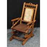 An American oak Childs rocking chair.