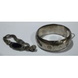 A 925 silver bangle; a silver stone set bracelet