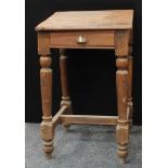 A tall pine lectern, sloped top, single frieze drawer, turned legs, H stretcher, 120cm high, 74cm