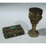 A 16th century style brass chalice, probably North Indian, 20cm high; a Tibetan/Nepalese white metal