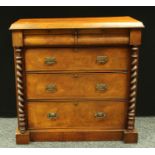 A 19th century Scottish mahogany chest of drawers, oversailing beveled rectangular top above two