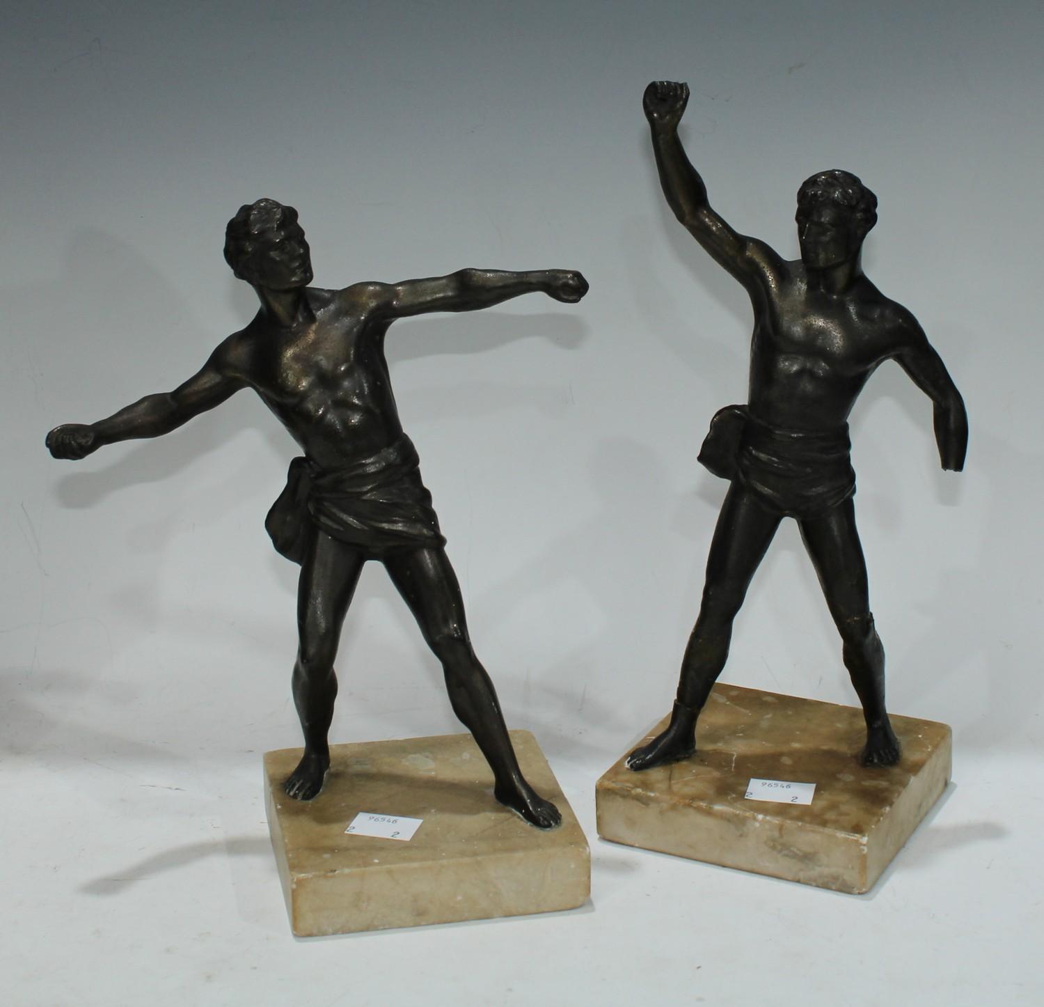 A 20th century bronzed spelter figure of a male Greek athlete, square marble base, 22cm high;