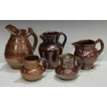 Five 19th century brown salt glazed stone ware jugs, one with a hunting scene (5)