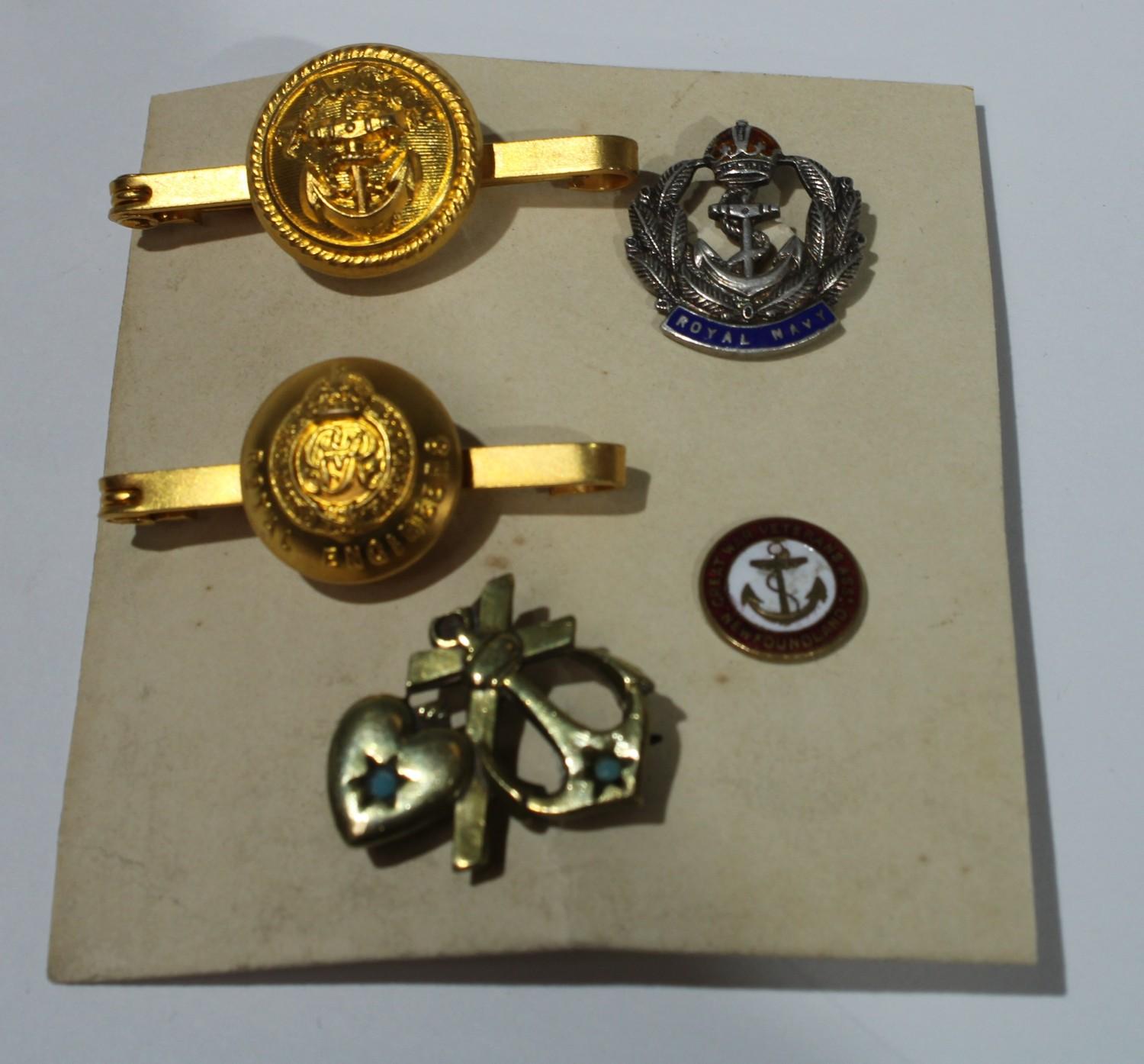 A Sterling silver and enamel Royal Navy badge; an anchor and heart badge; Great War Newfoundland
