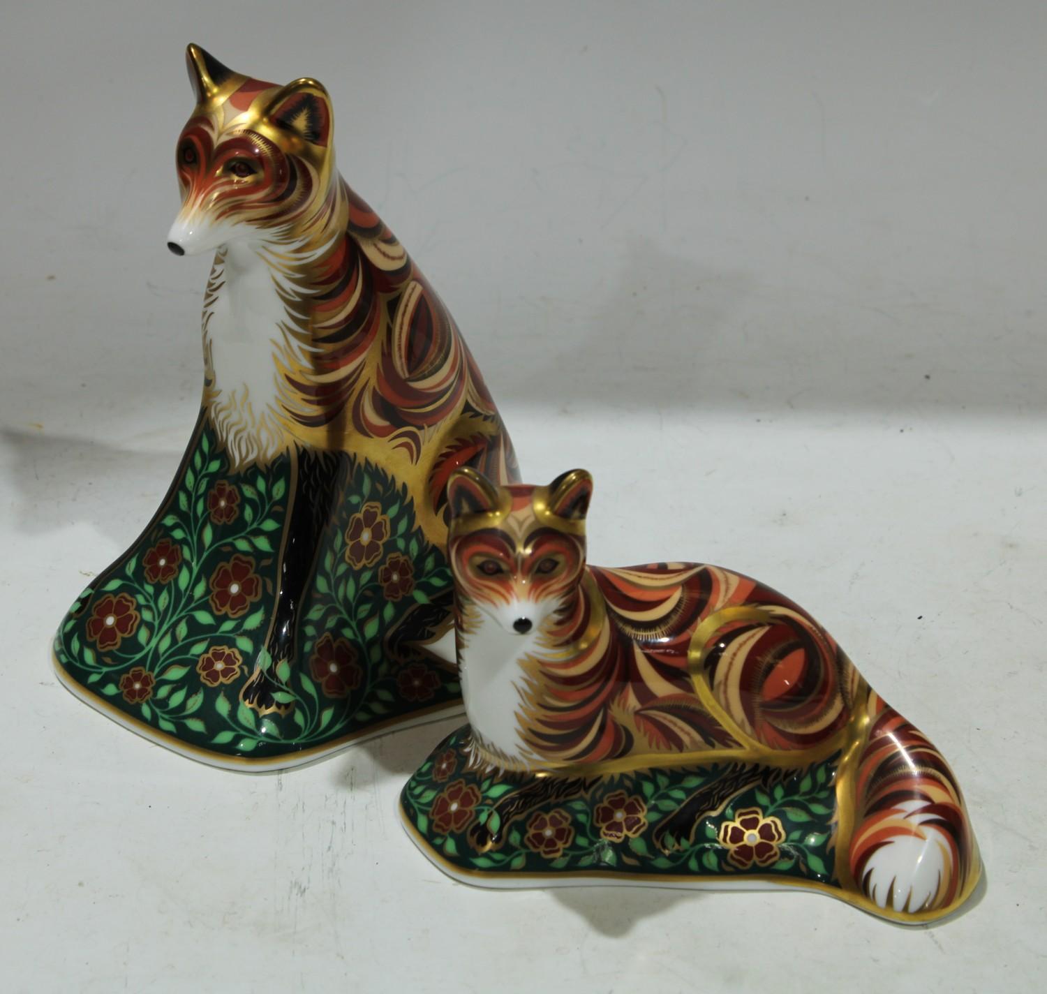 A Royal Crown Derby Vixen paperweight, gold stopper, unboxed and a Fox Cub paperweight, gold