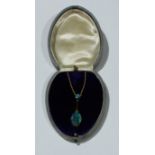 A double black opal pendant on 9ct chain
