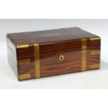 A Victorian brass bound rosewood travelling vanity case, fitted interior with accessories