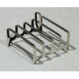 An Art Deco silver five bar toast rack, angular loop handle, bracket feet, Charles S Green & Co,
