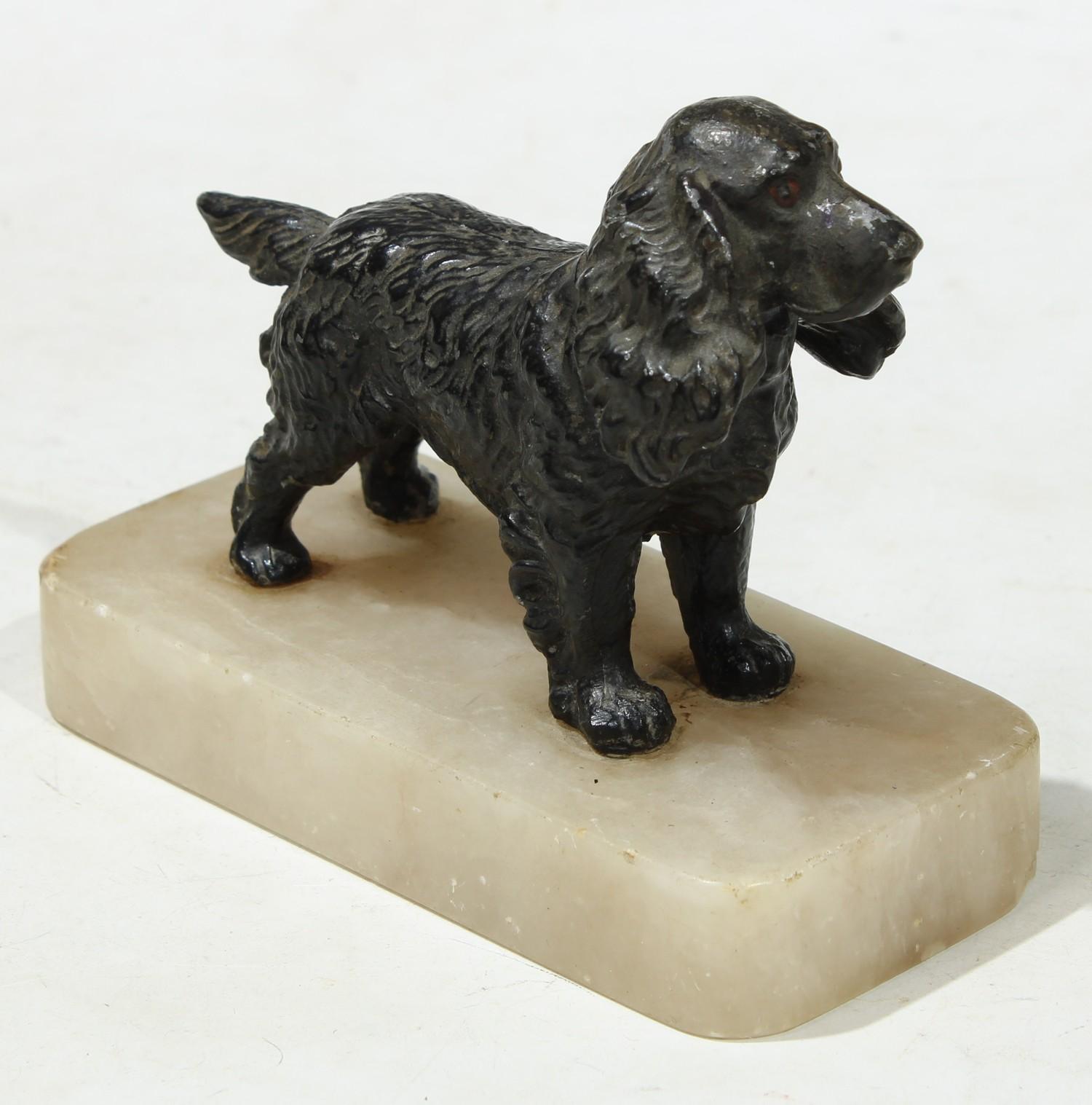 An early 20th century painted model of a spaniel, rectangular alabaster base, 12cm wide c.1920. - Image 2 of 2