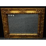 Interior Design - a gilt gesso framed wall mirror, moulded with acanthus leafy scrolls, 81cm x 68cm