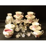 An Aynsley vase; a Staffordshire part tea set; a small faceted glass scent bottle; other scent