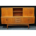 A mid 20th century teak G-plan sideboard. 121cm high, 188cm wide, 45cm deep