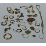 A 9ct gold bracelet, faults; other assorted 9ct gold , single earrings, broken chains, a love