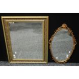 An oval gilt frame wall mirror, 66cm high; a rectangular wallmirror, 76cm (2)