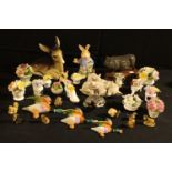 A Lladro model of a sow and piglets, approx. 17cm; a Beswick badger; a Royal Doulton model of a pig,