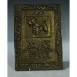 A mid 20th century pressed brass wall plaque, Doggie, embossed with terrier and poem, 29cm x 21cm
