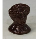A 19th century salt glazed stoneware window rest, modelled as a Maiden, possibly Queen Adelaide of