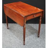 A 19th century mahogany Pembroke table, rectangular top, turned legs, 72cm high.