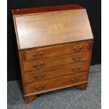 An Edwardian mahogany inlaid Sheraton revival fall front bureau inclosing pigeon holes and two short