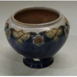 A Royal Doulton stoneware ovoid vase, tube lined with floral garlands, drip glazed in shades of