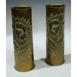 Trench art - a pair of WWI brass artillery shell cases with contemporary trench art decoration