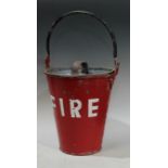 An early 20th century galvanised steel riveted fire bucket with cover