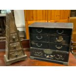 An oriental lacquered desk top cabinet; a South American desk top cabinet (2)