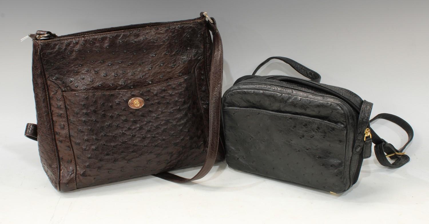 Luxury Fashion - an Italian brown ostrich skin lady's handbag, 31cm wide; another, black, 23cm wide,