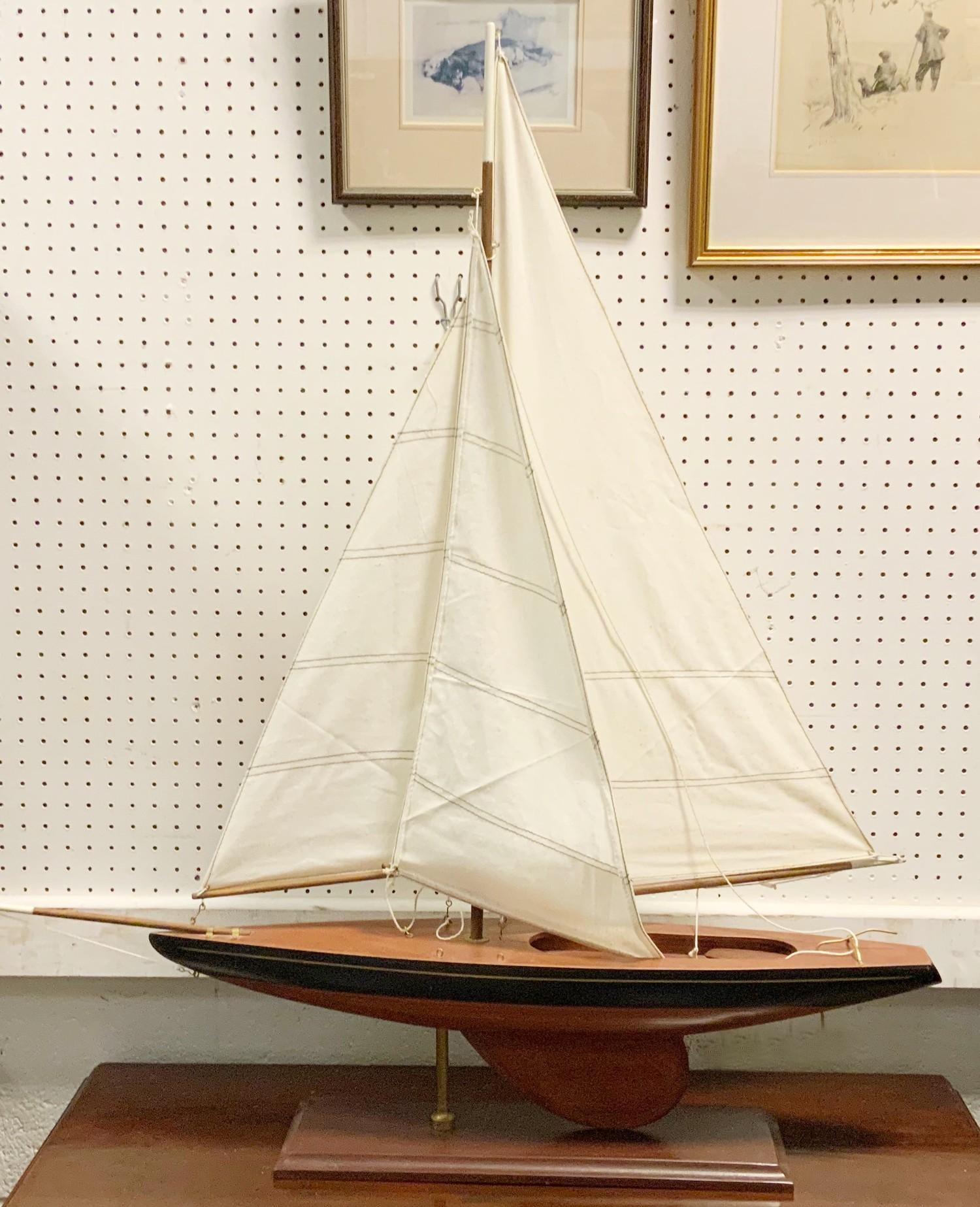 A pond yacht and stand