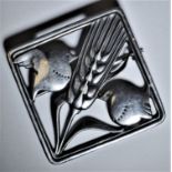 A Georg Jensen sterling silver brooch, No.250, designed by Arno Malinowski, of square form, cast and