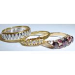 An 18ct gold five stone diamond ring, size P1/2, 3.1g; an 18ct yellow & white gold eternity ring set