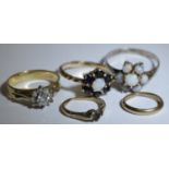 Jewellery - an 18ct gold diamond accented cluster ring, 3.3g; a 9ct gold cluster ring and 2
