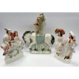 Ceramics - a 19th century drip glazed model naked figure on horse back; a Staffordshire figure group