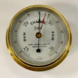 A Sestrel ship;s bulkhead barometer, Henry Browne and Sons Limited, Barking, Essex, brass case, 11cm