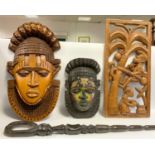 Tribal Carvings - a Nigerian carved wooden Warrior wall mask, inset with brass forehead design,