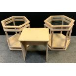 A pair of hexagonal limed oak glass inset topped coffee tables, turned supports, tied shelf