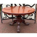 A Victorian mahogany loo table, circular top, turned column, cabriole legs, acanthus carved